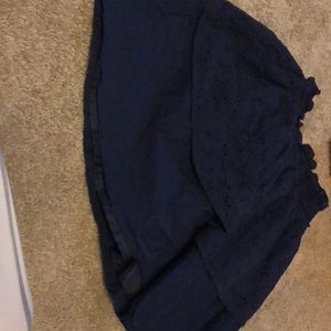 A navy blue skirt